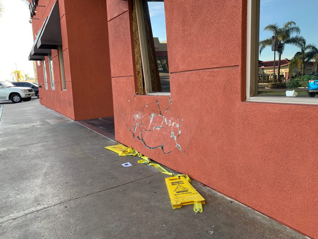 Vehicle-impact storefront demolition and repair in Orange County