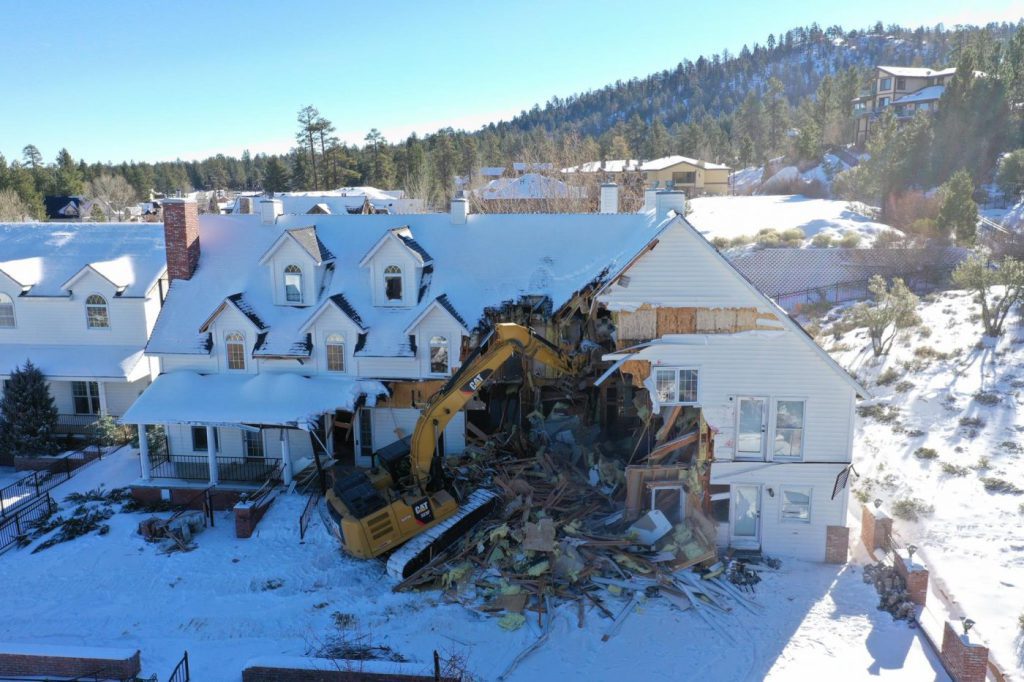 Three-story structure demolition in Big Bear Lake