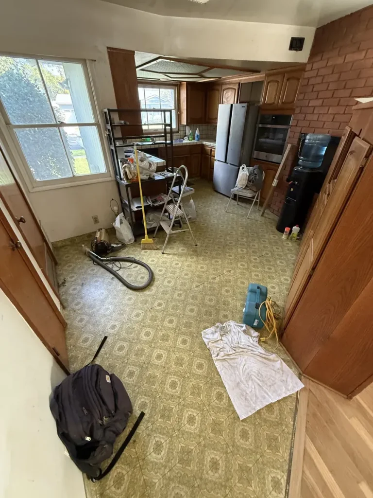Existing sheet flooring within the Santa Ana residence