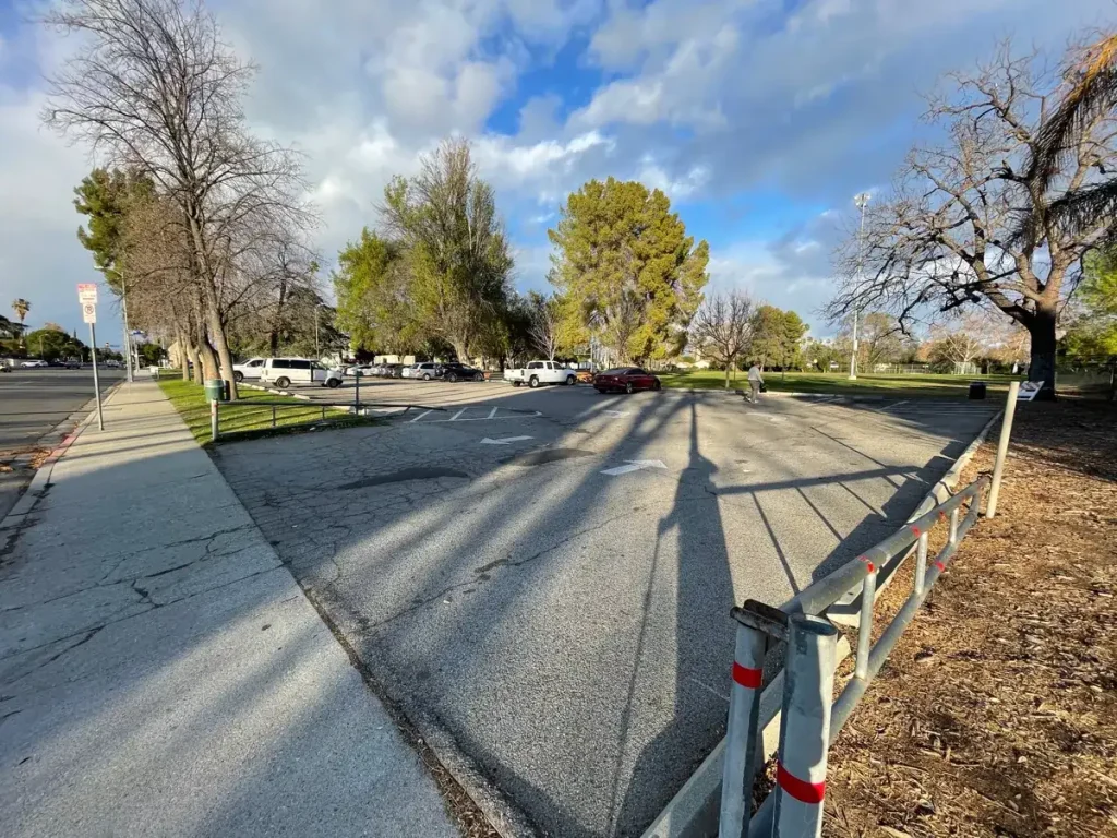 Cracked asphalt surface before removal in Lake Balboa