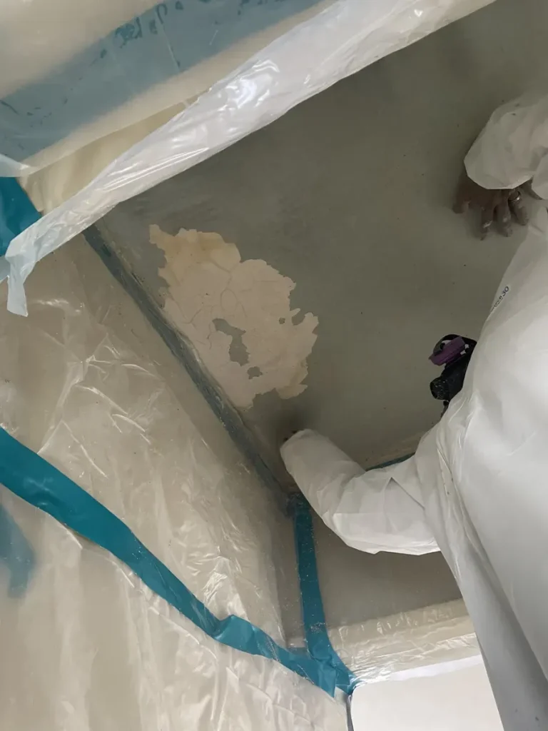 Protected room for acoustic ceiling removal in Compton
