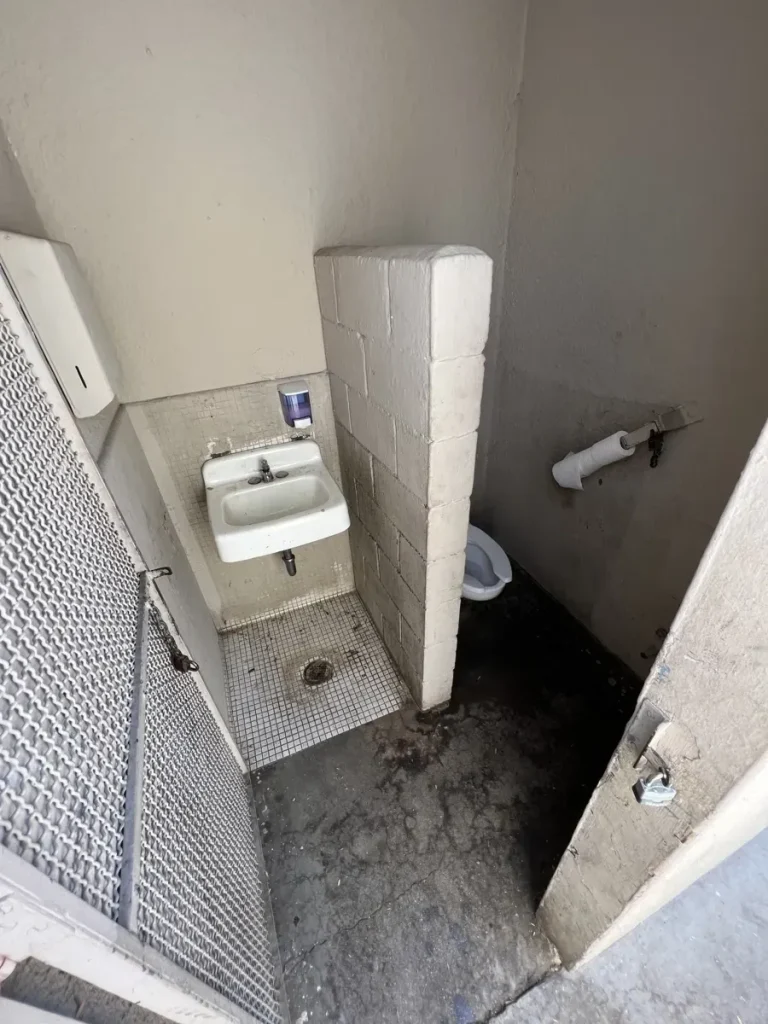 Existing Louise Park restroom building before demolition
