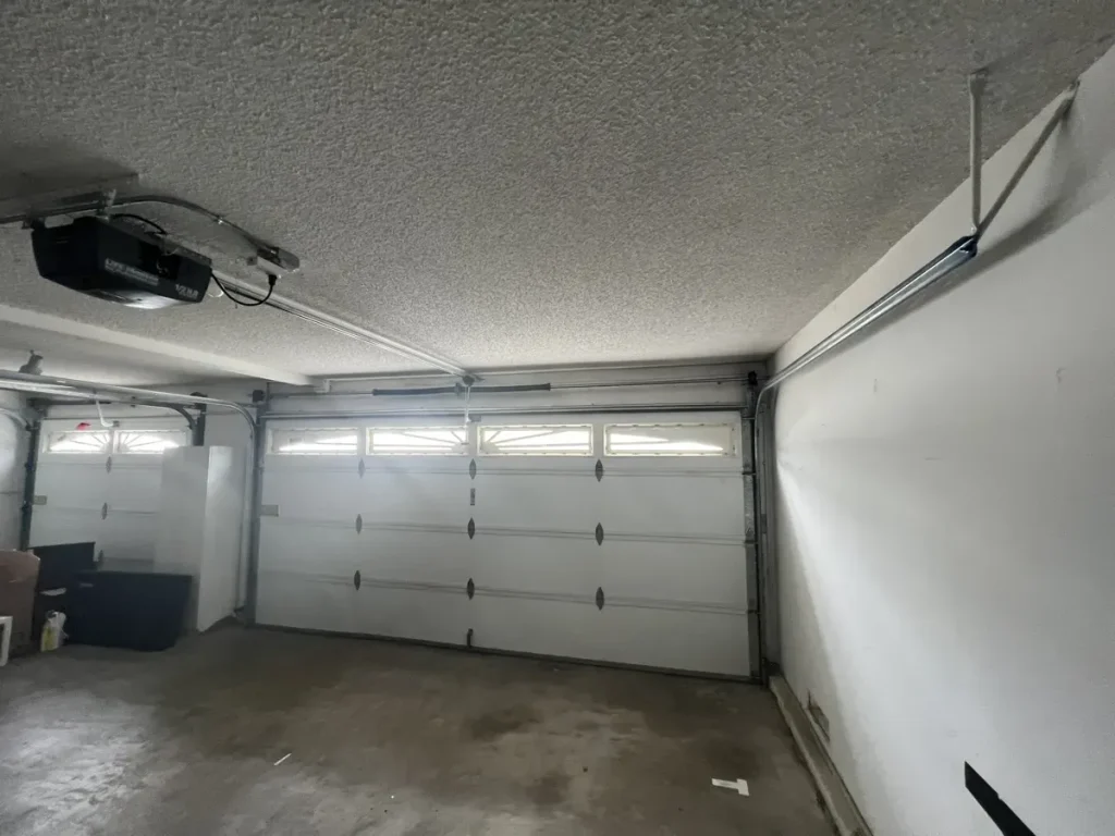 Existing garage interior at the Newport Beach Peninsula property
