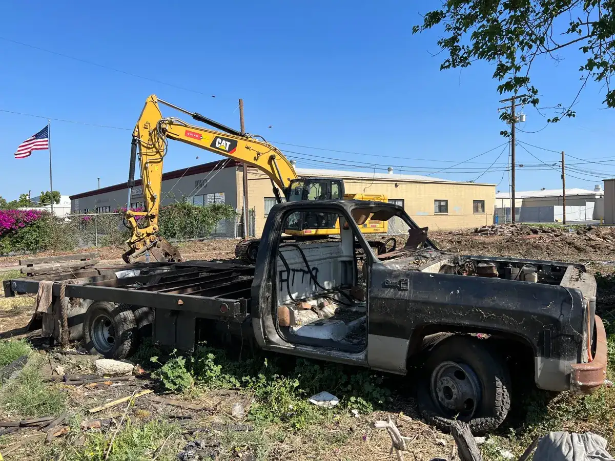 Fire-damaged Anaheim property before cleanup and pool removal
