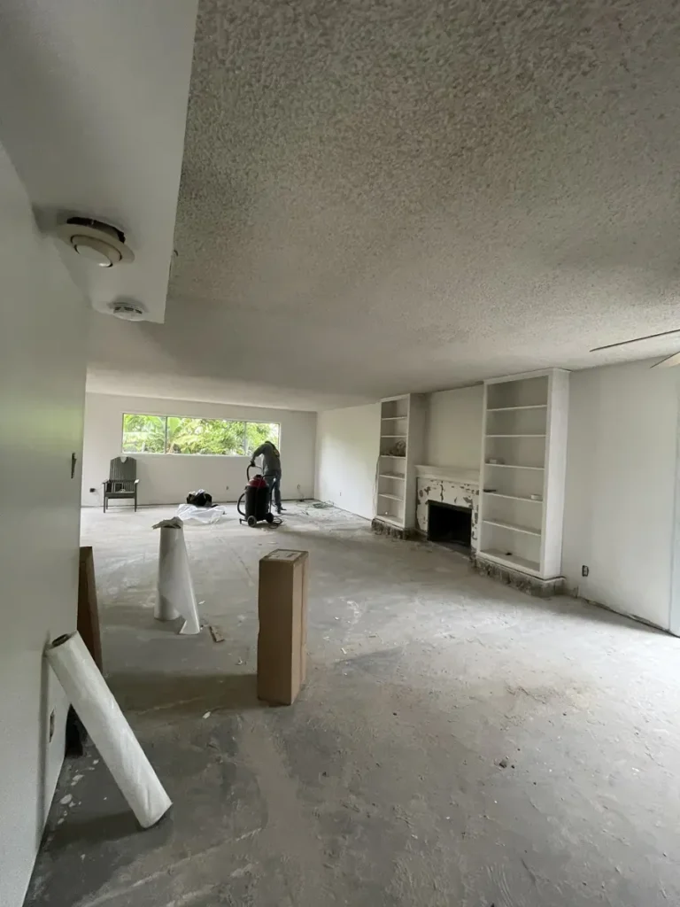 Acoustic ceiling finish before removal in Costa Mesa