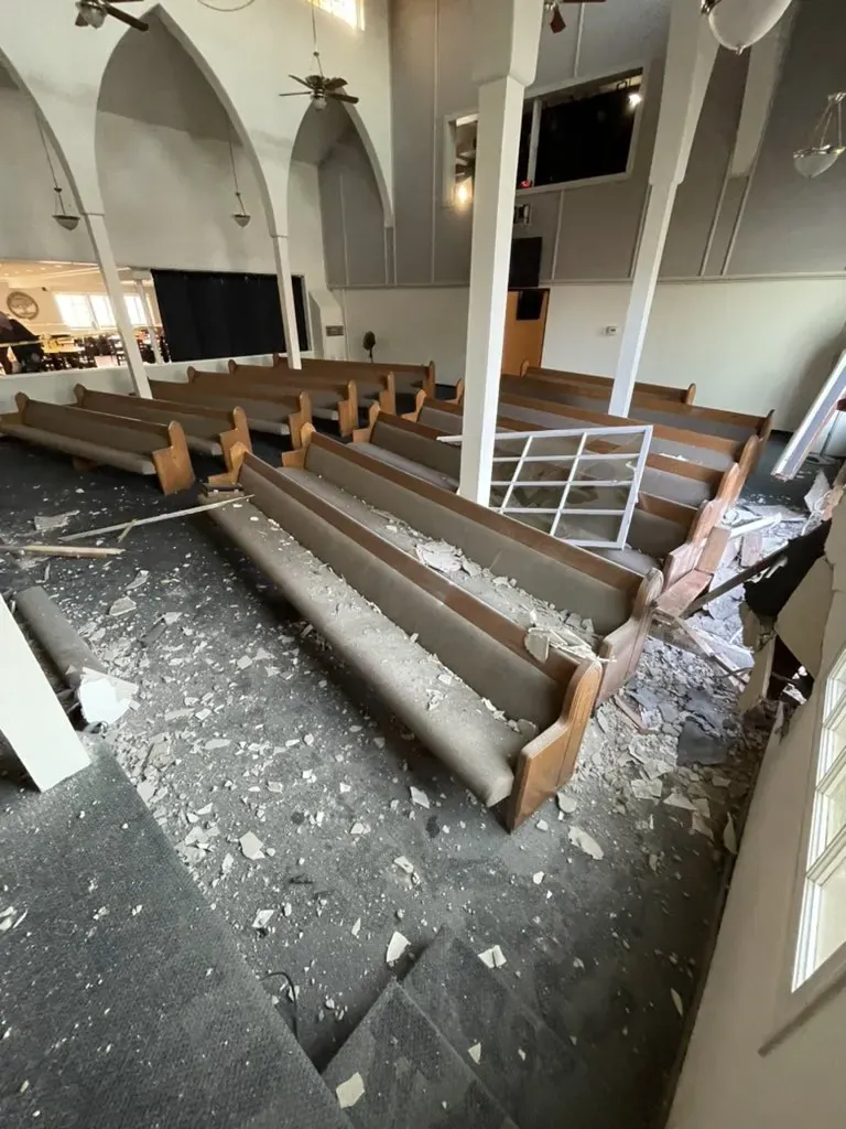 Vehicle-impact damage within the church interior