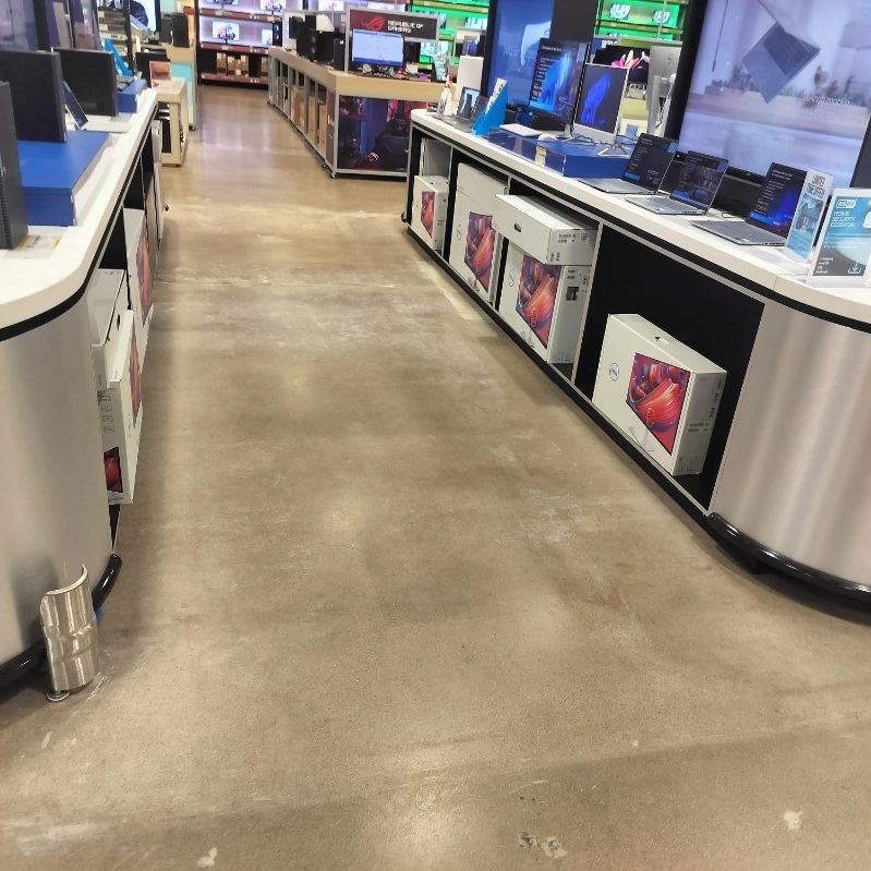 Exposed floor after covering removal at Micro Center